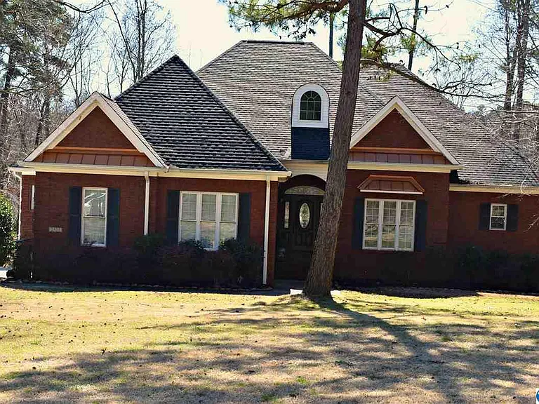 Brick home with new roof and trim near the lake in Scottsboro