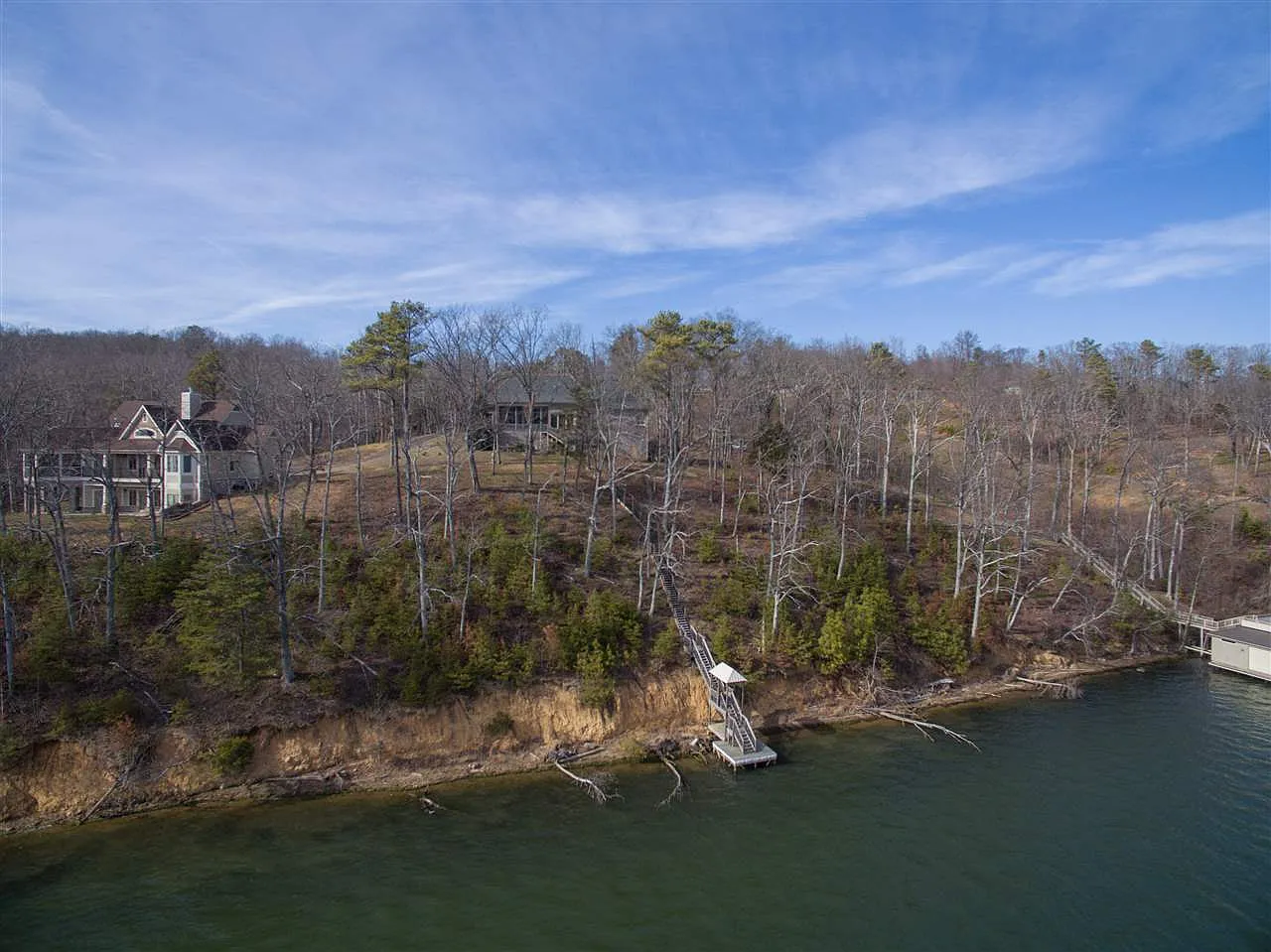 Lakefront wooded lot with dock access in Scottsboro, Alabama